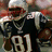 Pixelated image of a football player in a dark uniform with number 81, next to red background with text "Randy Moss Rules".