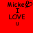 Red background with black pixelated text reading "Mickey I LOVE U" in two vertical , one featuring a heart symbol replacing the 'y' in Mickey