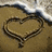 Four distinct visual arranged in a , each depicting a heart symbol or related imagery with varying styles and backgrounds