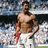 A pixelated image of a shirtless man with a beard standing in a stadium, holding a red object in his right hand.
