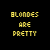 pixelated text blocks on a black background with yellow, red, and white text; show small white hearts in the bottom-right corner