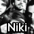 A static buddy icon featuring a black-and-white image of a person with dark hair, a group of people with red text, and a group of people outdoors with text.