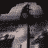 Animated sequence of a stylized figure with arched arms and rounded head in grayscale tones, cycling through motion states against dark background.