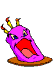 A purple cake-like character with yellow candles and red tips on a brown base, displaying multiple facial expressions