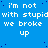 Blue background with white pixelated text repeating 'i'm not with stupid we broke up' in multiple , scattered dark blue dots across the surface