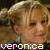 Two side-by-side pixelated images of a person with blonde hair and green earrings, each labeled with text at the bottom.