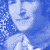 Pixelated blue-toned image of multiple people with overlaid text reading "I AM THE WALRUS GOO GOO GOO JOOB!" in a contact sheet layout.