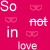 A static pixelated image with a solid pink background displays the phrase "So not in love" using white text and three red heart symbols arranged around it.