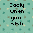Pixelated text on a patterned background with partial gray overlay.