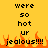 Pixelated text on a yellow background with orange flames at the bottom, displaying 'were so hot ur jealous!!!' in two identical vertical