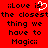 Red background with black pixelated text reading "::Love is the closest thing we have to Magic::" and a white heart symbol replacing the 'o' in Love.