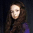 six shows a person with long brown hair and purple clothing against dark background, with text overlays changing across frames