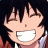 A pixelated anime-style character with dark hair and a wide grin appears on the left side of a contact sheet, while the right side displays stylized text reading "Anime IM" above smaller text that may be "COM" against a black background.