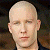 A 50x50 pixel buddy icon featuring a split composition with a person's face on the left and green text on a dark background on the right.