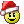 Pixelated yellow smiley face wearing red Santa hat with white trim and pom-pom, black eyes with white highlights, smiling mouth.
