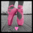 Pink ballet shoes on a person's feet with changing heart symbols below, set against a grayscale background.