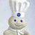 Pixelated bunny icon with white chef hat, blue gem on forehead, and beige body against light gray background.