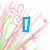 Animated sequence of blue text letters forming 'I Love You' over a pink and green floral background with heart motifs.
