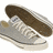 Two side-by-side sneakers with brown uppers and white laces, one displaying text overlay.