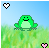 Pixelated green frog with light belly sits in grassy field under blue sky, two heart icons change color from white to red.