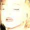 eight pixelated images showing a person with blonde hair in various facial expressions and poses, some with closed eyes and others with open mouths