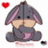 Pixelated character with dark gray body, light brown face, and pink inner ears sits cross-legged holding a small object.