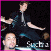 A four- shows a person in dark clothing with arms outstretched, overlaid text changing from "Such a" to "TEASE!!"