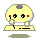 Pixelated yellow circular character with gray top spot, red cheeks, black eyes, and blue outline holding a white object near its face against light gray background.