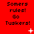 Red background with repeated text "Somers rules! Go Tuskers!" and scattered white pixel symbols including plus signs, stars, and dots.
