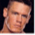 A pixelated image of a person with short dark hair and light skin, next to red text reading 'Cant See Me' on white background.