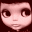 Pixelated doll avatar with pink skin and dark brown eyes, showing two sequential expressions against a dark red background.