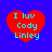 Four red heart shapes on a blue background, each containing cyan text reading "I luv Cody Linley" in pixelated font.