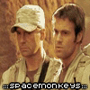 Four- shows two men in light-colored clothing with a cap, each displaying identical text below