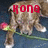 A pixelated cartoon elephant with red Cyrillic text above its head, holding a pink flower in one trunk while standing on green grass against a dark blue background.
