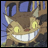 Pixelated image of a brown cat-like creature with large yellow eyes and a wide grin, next to black background with white text reading 'Anime IM' and 'com'.