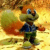 Pixelated cartoon character with green skin, blue eyes, and orange hair wearing a dark blue shirt and green pants stands against warm-toned background.