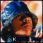 Animated contact sheet of a person wearing a blue hat with repeated text "Krazi Fan" across frames showing subtle facial expression changes against an orange background.