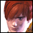 Pixelated image of a person with reddish-brown hair and blue eyes, next to black background with white text reading 'Anime IM' and 'com'
