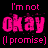 Pixelated text on black background showing 'I'm not okay (I promise)' in pink and white with visible pixelation artifacts.