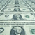 Static pixelated image showing a grid of small, indistinct icons with muted gray and green tones, arranged in rows and columns on a light background.