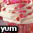 Pixelated image of a dessert with red toppings and white cream, featuring bold black-and-white text at the bottom.