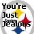 Static pixel art icon with bold black text reading "You're Just Jealous" over a white background, featuring three colored starbursts.