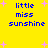 Yellow background with blue text reading 'little miss sunshine' and pink star shapes scattered across the image.