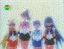 Animated sequence of anime characters in sailor fashions performing synchronized poses against colorful backgrounds with dynamic lighting effects.