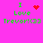 Pixelated green text on bright pink background reads 'I Love Trevor!<(33' with red heart and starburst symbols in four variations.