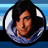 Pixelated circular portrait of a person with dark hair and a blue patterned collar against a blue gradient background with text reading ADAM SANDLER .COM