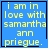 Blue background with yellow text reading "i am in love with samantha ann prieque." and a black heart symbol.