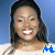 A pixelated image of a smiling woman with dark hair against a blue background, featuring repeated text elements in blue and white.