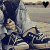 Pixelated image of a person in sneakers and light pants with a black heart symbol above the head, displayed across multiple overlapping frames.