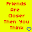 Yellow background with red pixelated text reading 'Friends Are Closer Then You Think' and a blue heart symbol.